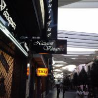 Rótulo luminoso, Banderola T invertida Boutique Nazaret Vázquez Dos Hermanas Sevilla