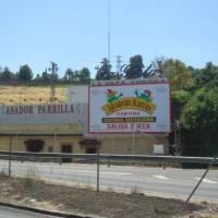 Valla publicitaria o cartelera, así como cartel de obra  panelable y rotulada con vinilo. Valla de 7.20 x 4 Iguanas Ranas Sevilla