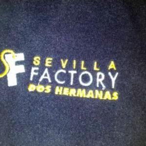 Bordado de Vestuario Laboral para Acciona Service. Servicio integral de Centros Comerciales.Sevilla