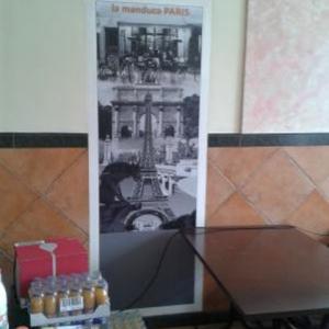 Rotulación de fotomurales en vinilo. Restaurante La Manduca, Sevilla