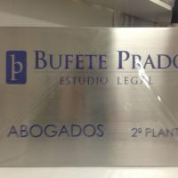 Rótulo cartel con rotulación Bufete Prado ( placa en acero inoxidable ) Sevilla