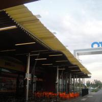 Toldos en lona plástica especial para lluvia de 450 mts en centro Comercial El Faro Badajoz. Trabajos realizados para Acciona Facility Services 