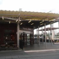 Toldos en lona plástica especial para lluvia de 450 mts en centro Comercial El Faro Badajoz. Trabajos realizados para Acciona Facility Services 