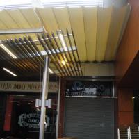 Toldos en lona plástica especial para lluvia de 450 mts en centro Comercial El Faro Badajoz. Trabajos realizados para Acciona Facility Services 