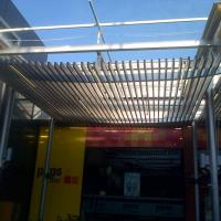 Toldos en lona plástica especial para lluvia de 450 mts en centro Comercial El Faro Badajoz. Trabajos realizados para Acciona Facility Services 