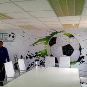 Rotulación de fotomural en vinilos en interior Promosport Sevilla