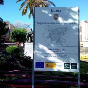 Valla publicitaria o cartelera, así como cartel de obra  panelable y rotulada con vinilo. Programa 2016 de Fomento Agrario del Ayuntamiento de Utrera Sevilla