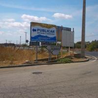 Valla publicitaria o cartelera, así como cartel de obra  panelable y rotulada con vinilo. Valla indicadora publicar, Polígono de la Palmera Dos Hermanas Sevilla.