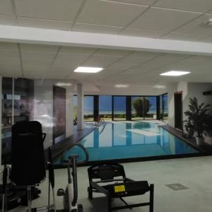 Rotulación de foto mural en vinilo especial de pared laminado.Garaje parking en Dos Hermanas Sevilla.