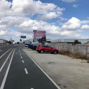 Cartel de obra o valla publicitaria de 3x3 mts. Polígono industrial Los Girasoles  Sevilla.