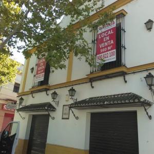 Lona publicitaria para venta de viviviendas y locales en distintas poblaciones de Sevilla para Aliseda.