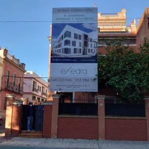 Valla cartel  de obra o publicitario para Grupo Porcelanosa en Sevilla.
